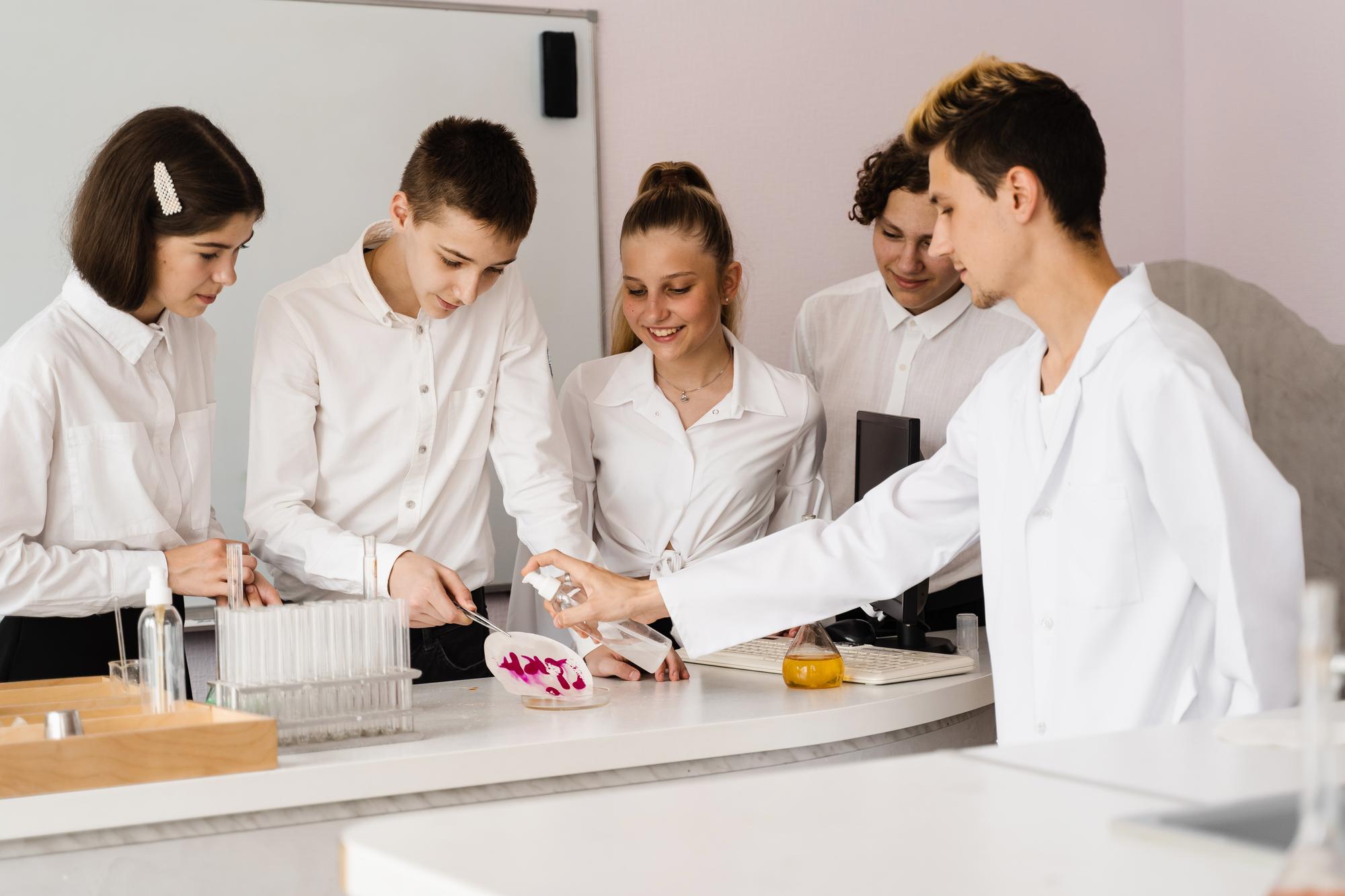 Small group cooking in futuristic kitchen